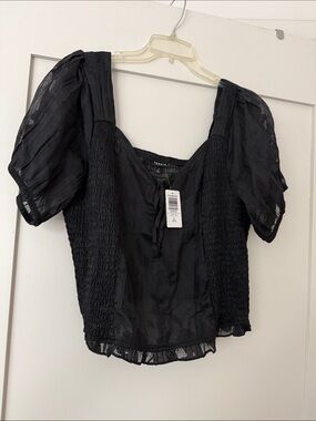 Torrid. NWT. 2X.  Black Smocked Puff Sleeve Peasant Top